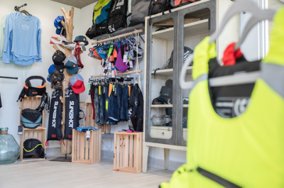 Kite centre shop with wetsuits, harnesses and buoyancy vests at Sultan Kite School